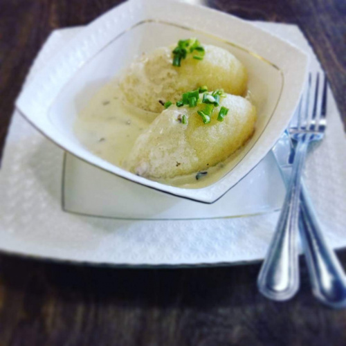 Lithuanian traditional potatoes dish "Cepelinai" with meat